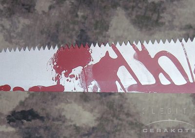 Gerber machete with Halloween-themed blood-splatter Cerakote