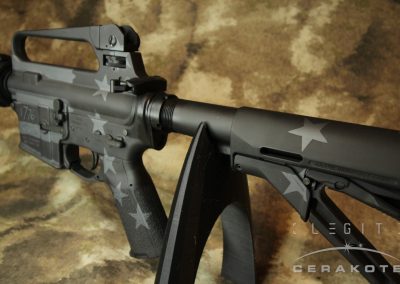 M4 Carbine with subdued black and gray tattered Betsy Ross flag themed custom Cerakote.