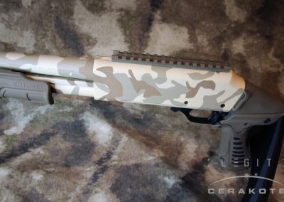 H&R Pardner Shotgun in stenciled large blob camouflage pattern with desert color Cerakote.