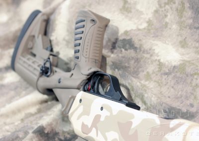H&R Pardner Shotgun in stenciled large blob camouflage pattern with desert color Cerakote.